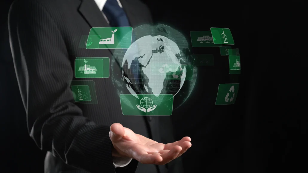 A diverse group of small and medium-sized enterprise (SME) employees from various industries, working together in a collaborative workspace, symbolizing the importance of sustainability and environmental responsibility during challenging times.